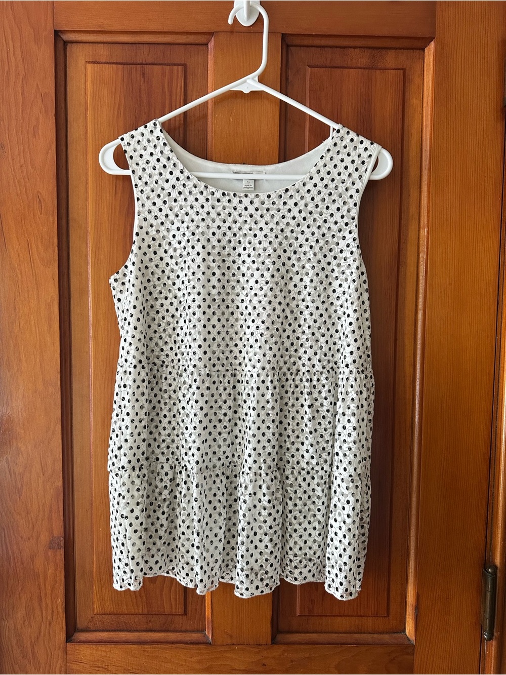 Sleeveless White Eyelet Peplum Blouse with Black Dot Embroidery